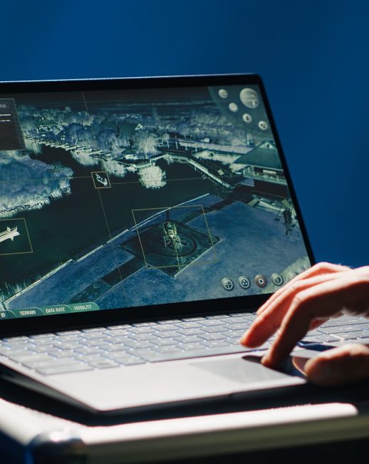 European Union using radar system on laptop to detect incoming ballistic missiles attacking member states. EU alliance army soldier scanning rockets approaching countries, deploying shields, camera A